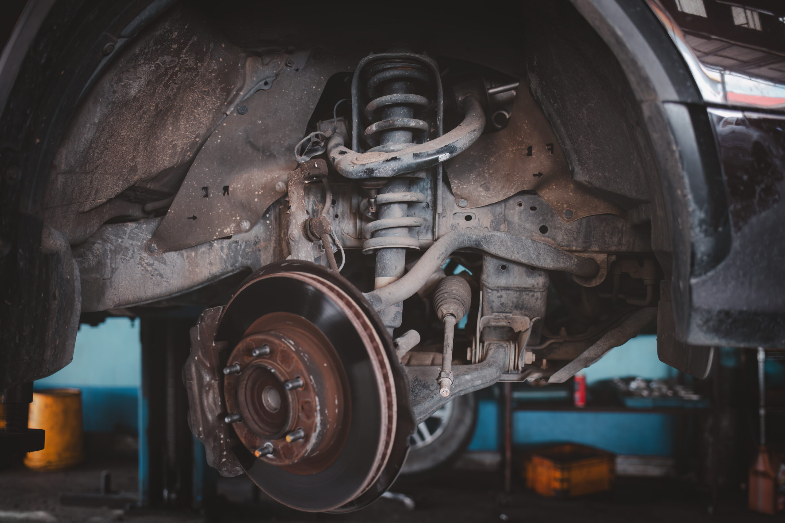 automotive-suspension-component-in-repair-shop-2026-01-08-22-31-56-utc